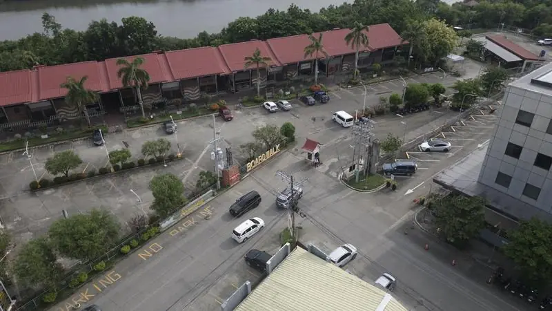 Aerial view of Riverside Iloilo's buildings with parking along the road